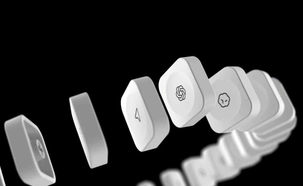 Close-up of the swappable keycaps, one carrying the OpenAI logo